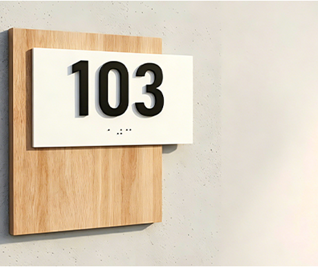 Custom braille/ADA signs